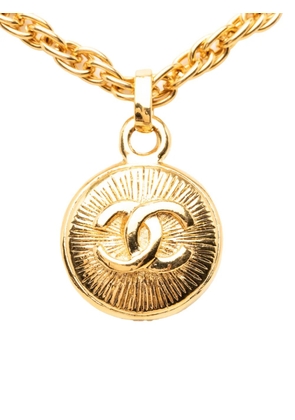 CHANEL Pre-Owned 1970-1980 CC Gold Plated Medallion Sunburst Pendant Necklace costume necklace