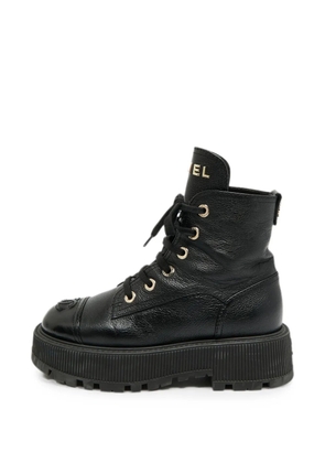 CHANEL Pre-Owned CC lace-up combat boots - Black