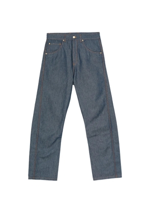 Moschino contrast-stitching logo-patch jeans - Blue