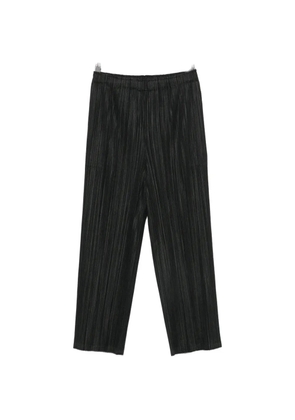 Pleats Please Issey Miyake plissed-effect trousers - Black