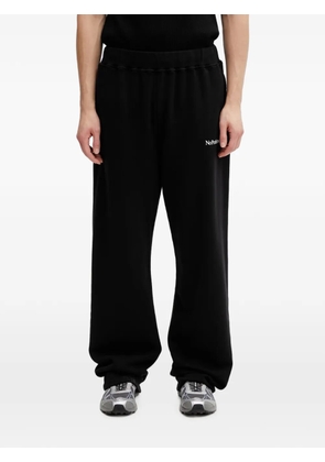 NO PROBLEMO logo-print track oversized fit pants - Black