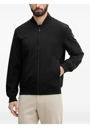 GUESS USA logo-patch bomber jacket - Black