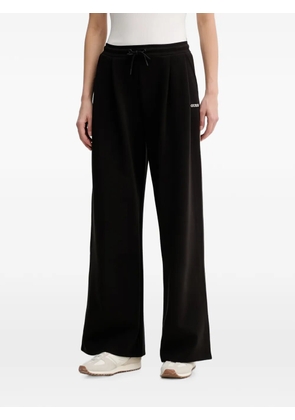 GUESS USA logo-print drawstring track pants - Black