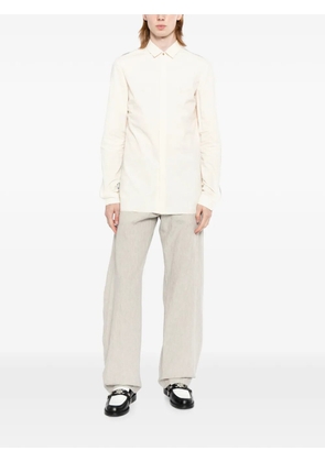 Ma+ cross-embossed trousers - Neutrals