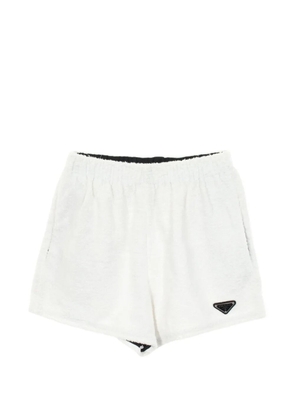 Prada Pre-Owned 2010s logo-plate pile shorts - White
