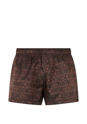 Moschino logo-print elasticated-waistband track shorts - Brown