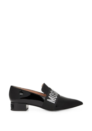 Moschino crystal-embellished logo-plaque pumps - Black