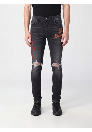 AMIRI South Cali Skinny Jeans in Stretch Denim with Patches and Distressed Effect