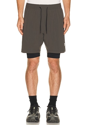 Reigning Champ 4-Way Stretch Nylon Combo Standard Training Short 7 in Carbon - Grey. Size XXL/2X (also in L, XL/1X).