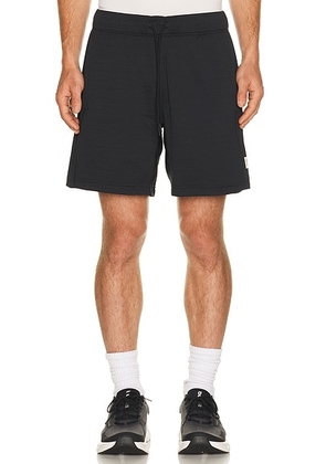 Reigning Champ Solotex Mesh Tiebreak Standard Short 7 in Heather Black - Black. Size XL/1X (also in M, L).