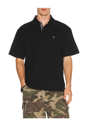 Brixton Anton Short Sleeve Polo in Black. Size S. Also in L, M, XL/1X.