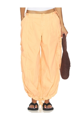 Free People x FP Movement Charmer Utility Pant in Orange. Size XS. Also in S, M, L, XL.