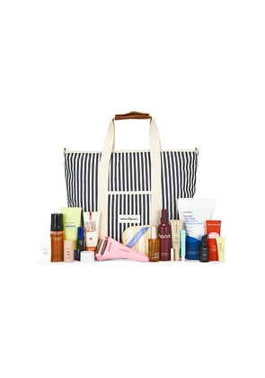 REVOLVE Beauty Summer Essentials Beauty Bag in Navy.