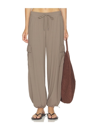 Splits59 Nico Airweight Cargo Pant in Black in Beige. Size XS. Also in S, M, L.