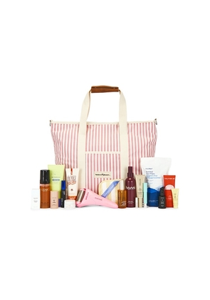REVOLVE Beauty Summer Essentials Beauty Bag in Pink.