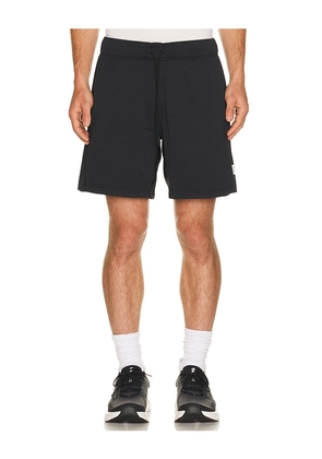 Reigning Champ Solotex Mesh Tiebreak Standard Short 7 in Black. Size S. Also in M, L, XL/1X.