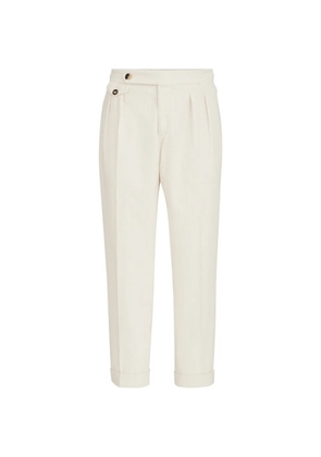 Brunello Cucinelli garment-dyed trousers in cotton corduroy with reversed double pleats and waist tabs - Neutrals