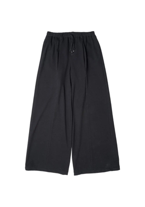 Yoshiokubo pleated wide-leg trousers - Black
