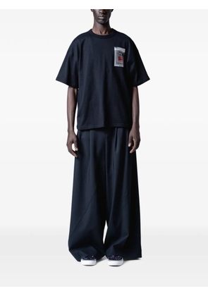 Yoshiokubo Twist pleated wide-leg trousers - Black