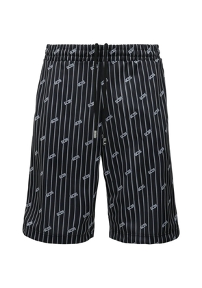 GCDS pinstripe logo-print shorts - Black
