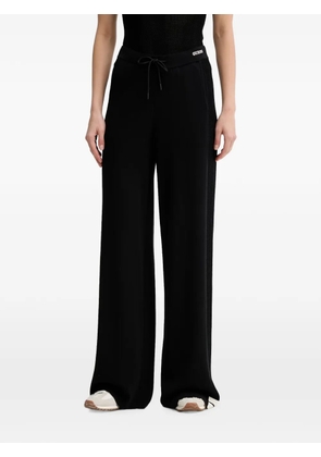 GUESS USA wide-leg logo-embroidered track pants - Black