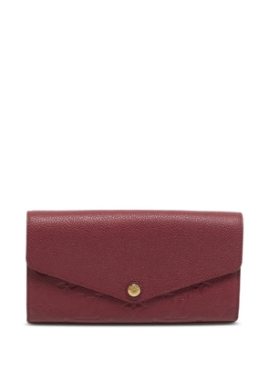 Louis Vuitton Pre-Owned Sarah Monogram Empreinte wallet - Red