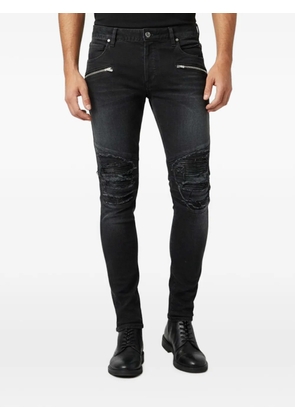 Balmain Pre-Owned distressed ribbed jeans - Black