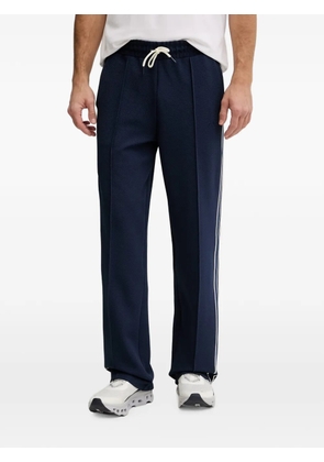 GUESS USA side-stripe track pants - Blue