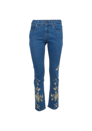 Gucci Pre-Owned floral-embroidered jeans - Blue