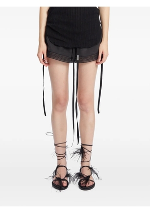 Ann Demeulemeester Sukhada feather tie sandals - Black