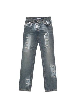 Dolce & Gabbana Pre-Owned 2000s paint-splatter distressed jeans - Blue