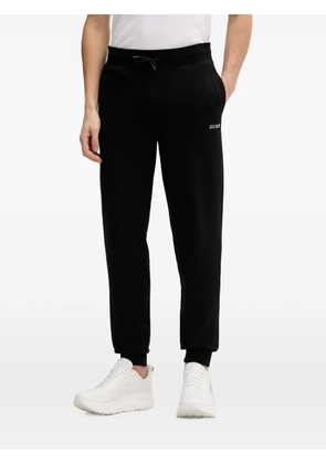 GUESS USA logo-print drawstring track pants - Black