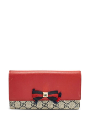 Gucci Pre-Owned GG Supreme crystal-bow wallet - Red