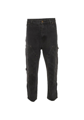 Louis Vuitton Pre-Owned embossed-details carpenter denim jeans - Black
