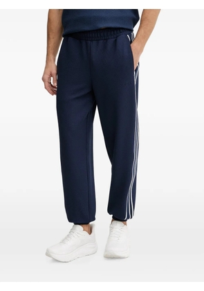 GUESS USA side-stripe track pants - Blue