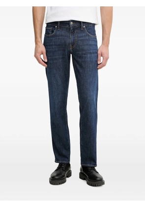 GUESS USA logo-patch slim-fit jeans - Blue