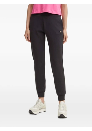 GUESS USA logo-plaque track pants - Black