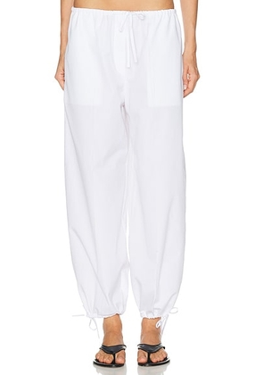 Toteme Drawstring Cotton Trouser in White - White. Size 34 (also in 32, 36, 38, 40, 42).