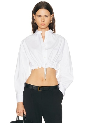 Carolina Herrera Long Sleeve Button Down Cropped Top in White - White. Size 4 (also in 2, 6).