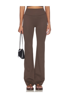 NikeSKIMS Matte Slim Flare Pant in Brown. Size S. Also in XXS.