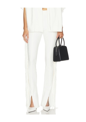 Norma Kamali Fringe Spat Jeans in White. Size XXS. Also in XS, S, M, L, XL.