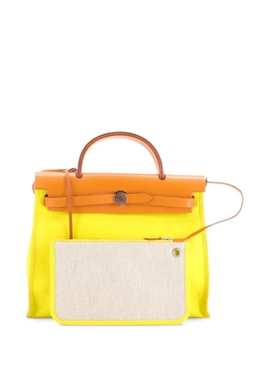 Hermès Pre-Owned Herbag Zip Berline Vache Canvas and Leather 31 shoulder bag - Yellow