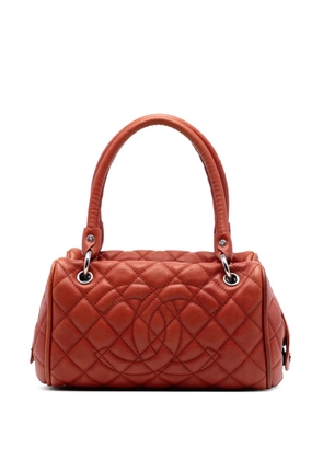 CHANEL Pre-Owned 2008-2009 Large Quilted Caviar Timeless Classic Bowler Bag handbag - Orange