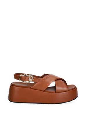Love Moschino crossover-strap heart-buckle sandals - Brown