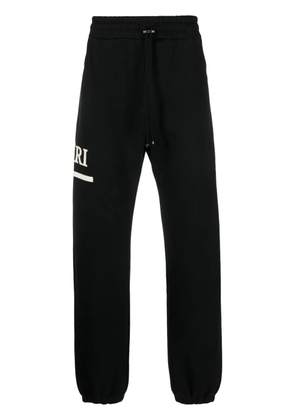 AMIRI logo-engraved cotton track trousers - Black