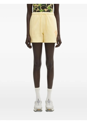 A BATHING APE® logo-print drawstring shorts - Yellow