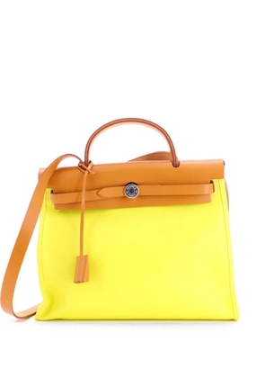 Hermès Pre-Owned Herbag Zip Berline Vache Canvas and Leather 31 shoulder bag - Yellow