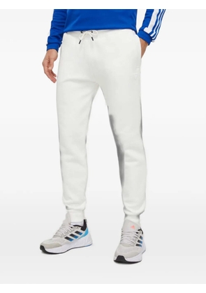 GUESS USA logo-patch drawstring track pants - White