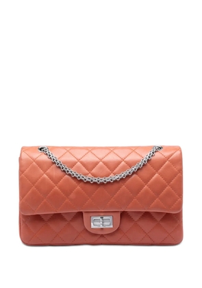 CHANEL Pre-Owned 2010-2011 Quilted Lambskin Reissue 2.55 Double Flap 227 shoulder bag - Orange
