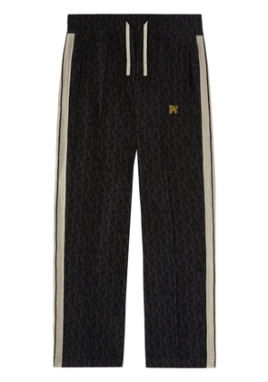Palm Angels dragon-monogram track pants - Black